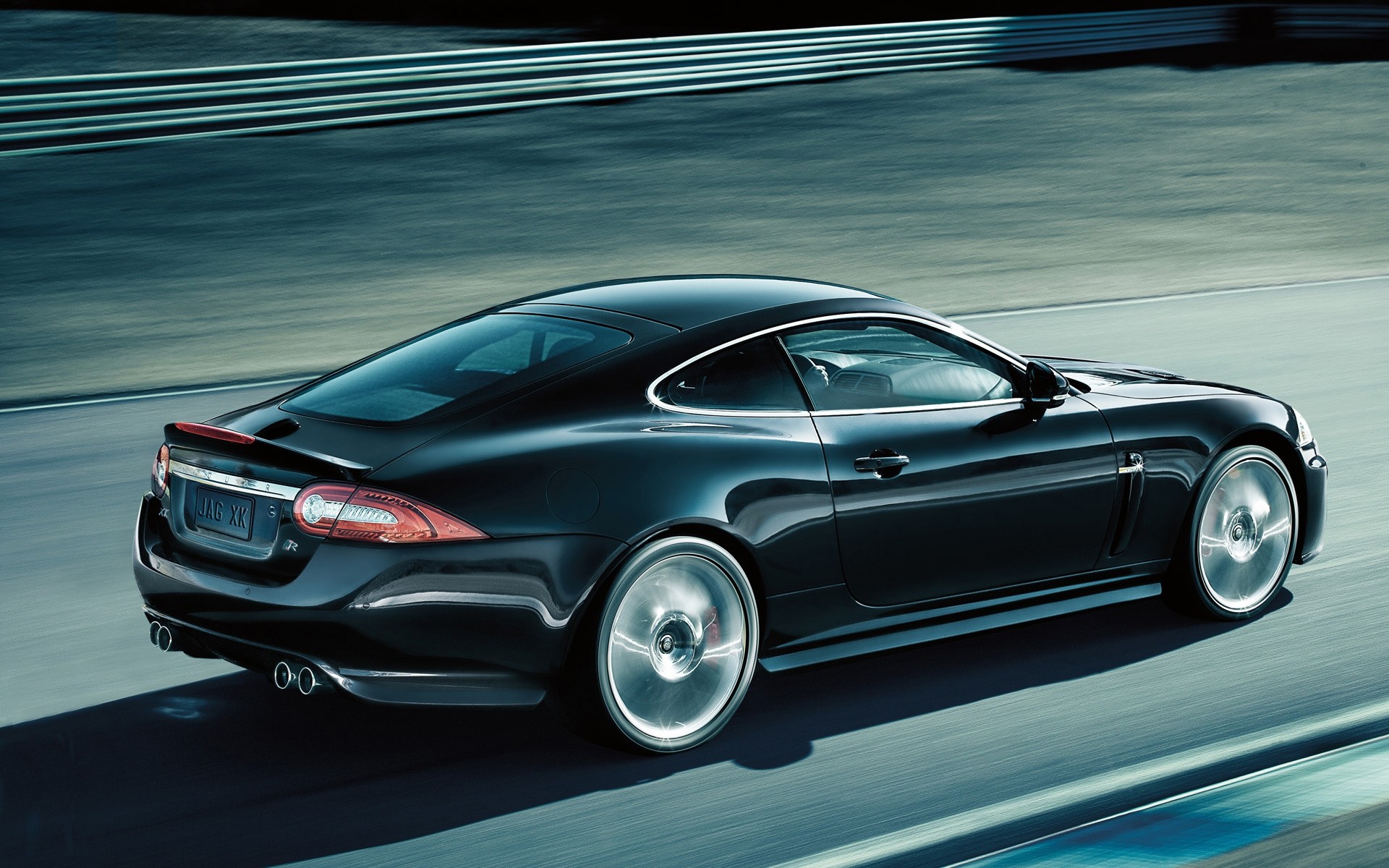 jaguar araba araba otomotiv hızlı coupe ulaşım sistemi asfalt tekerlekler acele et kaldırım sürücü siyah sedan kaput göster hız jaguar ve ileri teknoloji