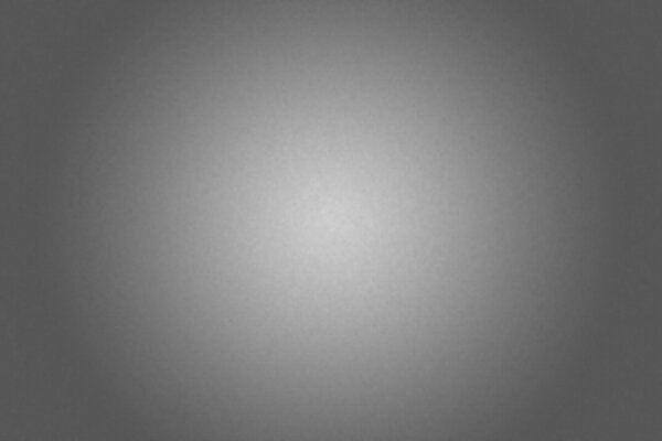 Arka planın ortasında aydınlanma ile minimal gri