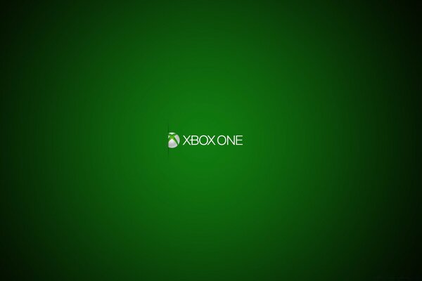 Xbox One konsolunun yeşil arka plana karşı spot ışığındaki logosu